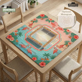 Pink mahjong mat with flamingos, palm leaves, hibiscus flowers, and aqua tropical background.