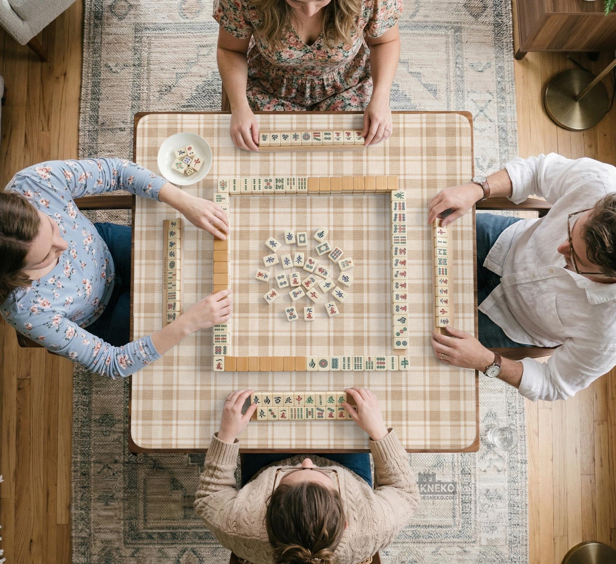 Beige plaid mahjong mat with a cream tartan pattern on a neutral background.