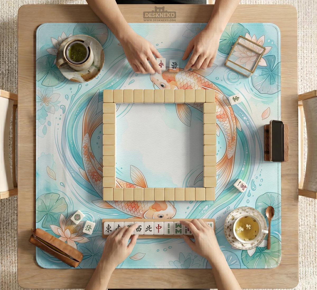A soft blue mahjong mat with koi fish, floating lily pads, pale floral details, and a watercolor-style pond design.