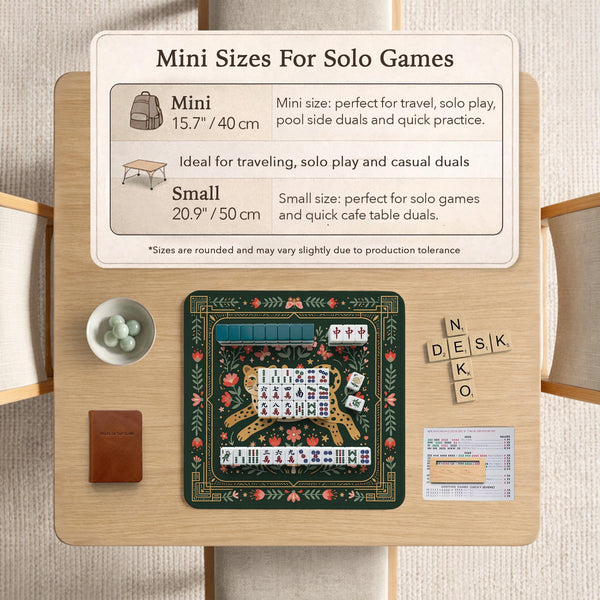 Dark green square mahjong mat with a golden spotted leopard in the center, surrounded by flowers, leafy stems, butterflies, and small star accents.