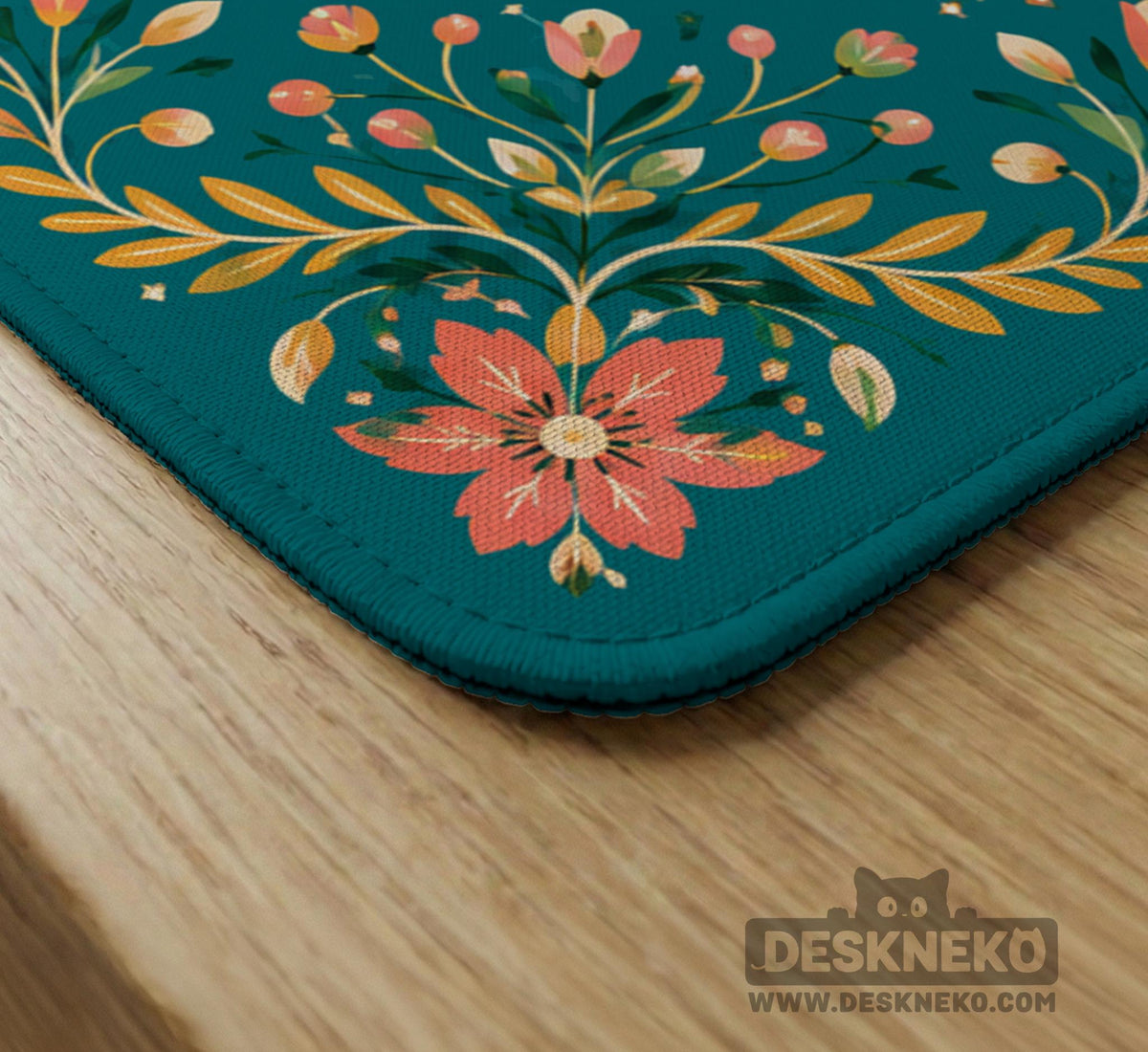 Green mahjong mat with a botanical bee and floral mandala design in teal, coral, cream, and gold.