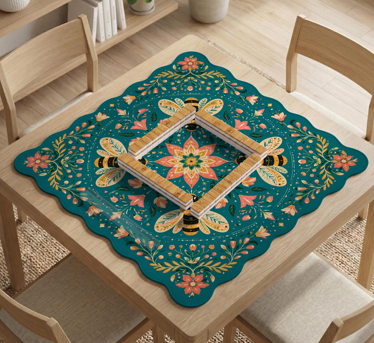 Green mahjong mat with a botanical bee and floral mandala design in teal, coral, cream, and gold.