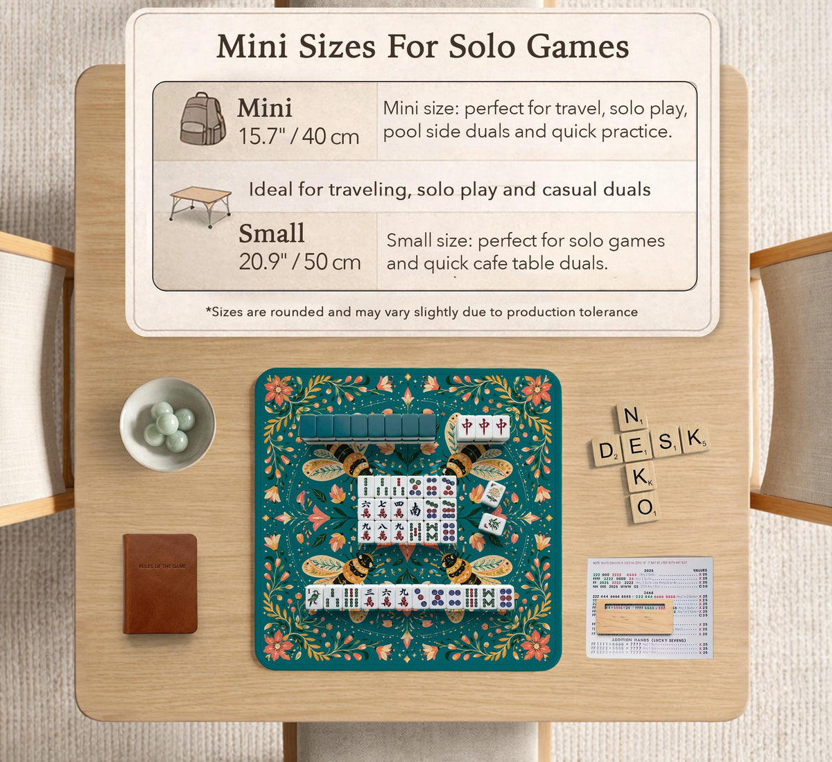 Green mahjong mat with a botanical bee and floral mandala design in teal, coral, cream, and gold.