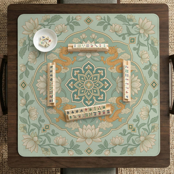 Sage green square mahjong mat with lotus flowers, golden dragons, and an ornamental center design.