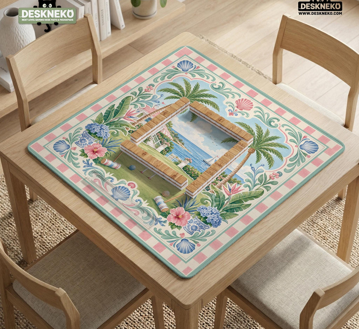 Pastel mahjong mat with a pink gingham border, seashells, hydrangea pots, palm trees, croquet details, and a coastal garden scene.