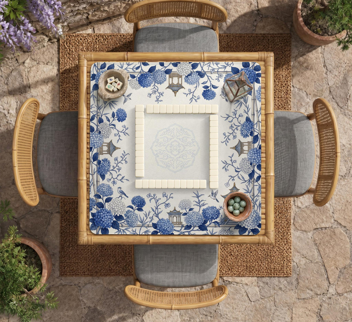 Blue and white square mahjong mat with a hydrangea and bird botanical border and a plain center area.
