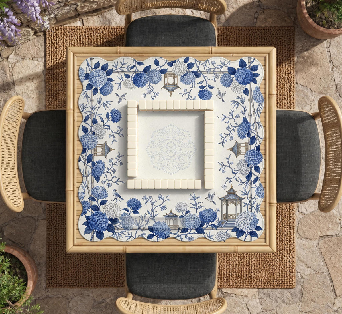 Blue and white square mahjong mat with a hydrangea and bird botanical border and a plain center area.