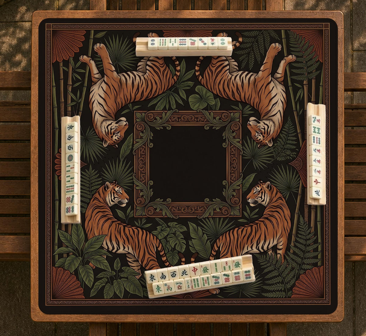Black square mahjong mat with mirrored tiger faces, bamboo, dark tropical leaves, ornate border details, and orange accents.