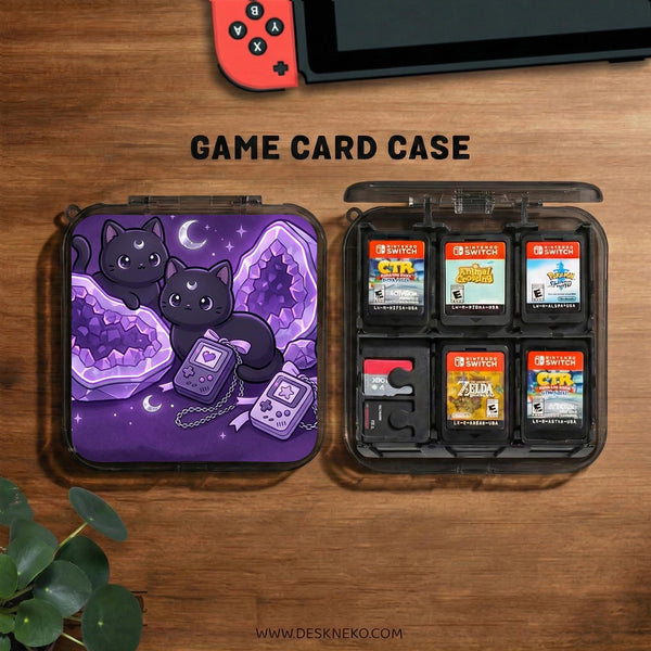 Purple carrying case with black cat faces, moon shapes, stars, and crystal geode style artwork for Nintendo Switch.