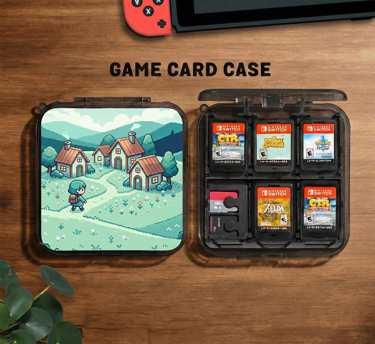 Teal carrying case with a pixel-style village scene, small houses, layered mountains, flowers, and a retro game-inspired landscape design.
