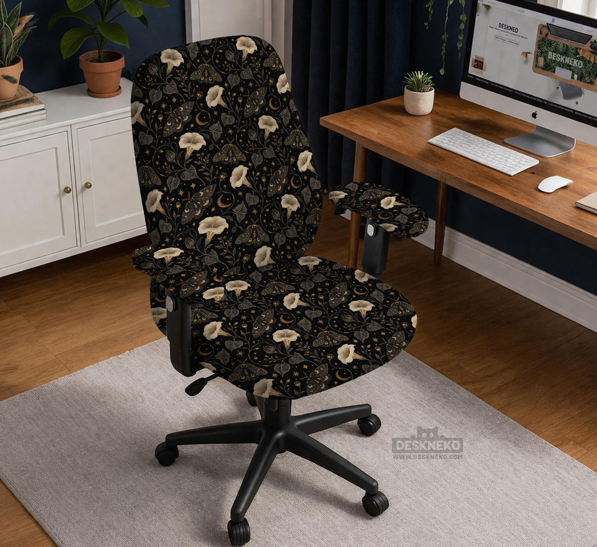 Black chair cover with a moth, moon, and flower pattern in gold, ivory, and dark botanical tones.