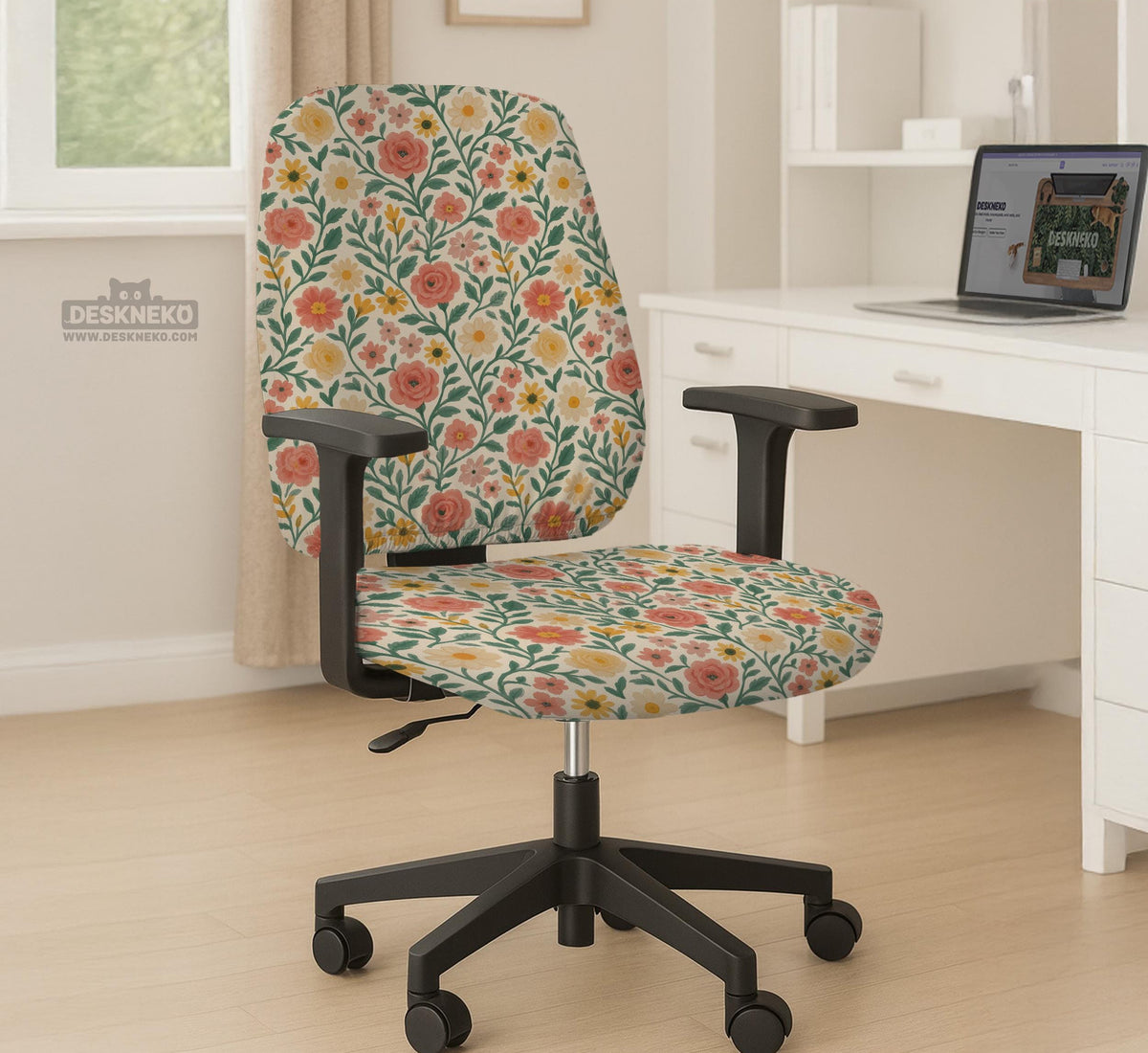 Cream desk chair cover with a vintage floral print featuring coral roses, mustard daisies, and green vines on a chair.