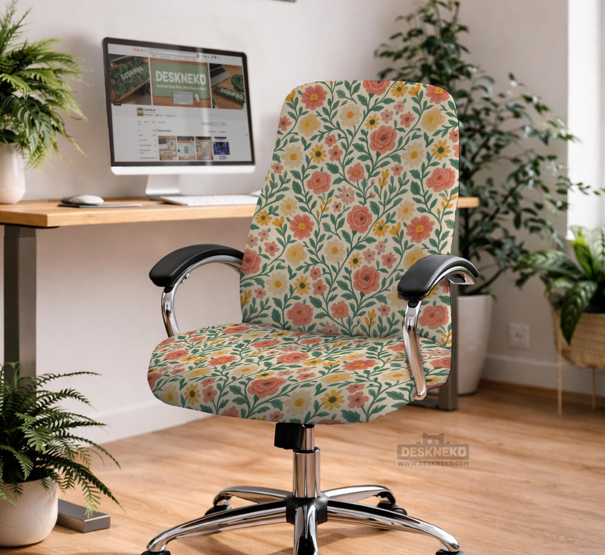 Cream desk chair cover with a vintage floral print featuring coral roses, mustard daisies, and green vines on a chair.