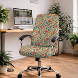 Cream desk chair cover with a vintage floral print featuring coral roses, mustard daisies, and green vines on a chair.