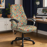 Cream desk chair cover with a vintage floral print featuring coral roses, mustard daisies, and green vines on a chair.
