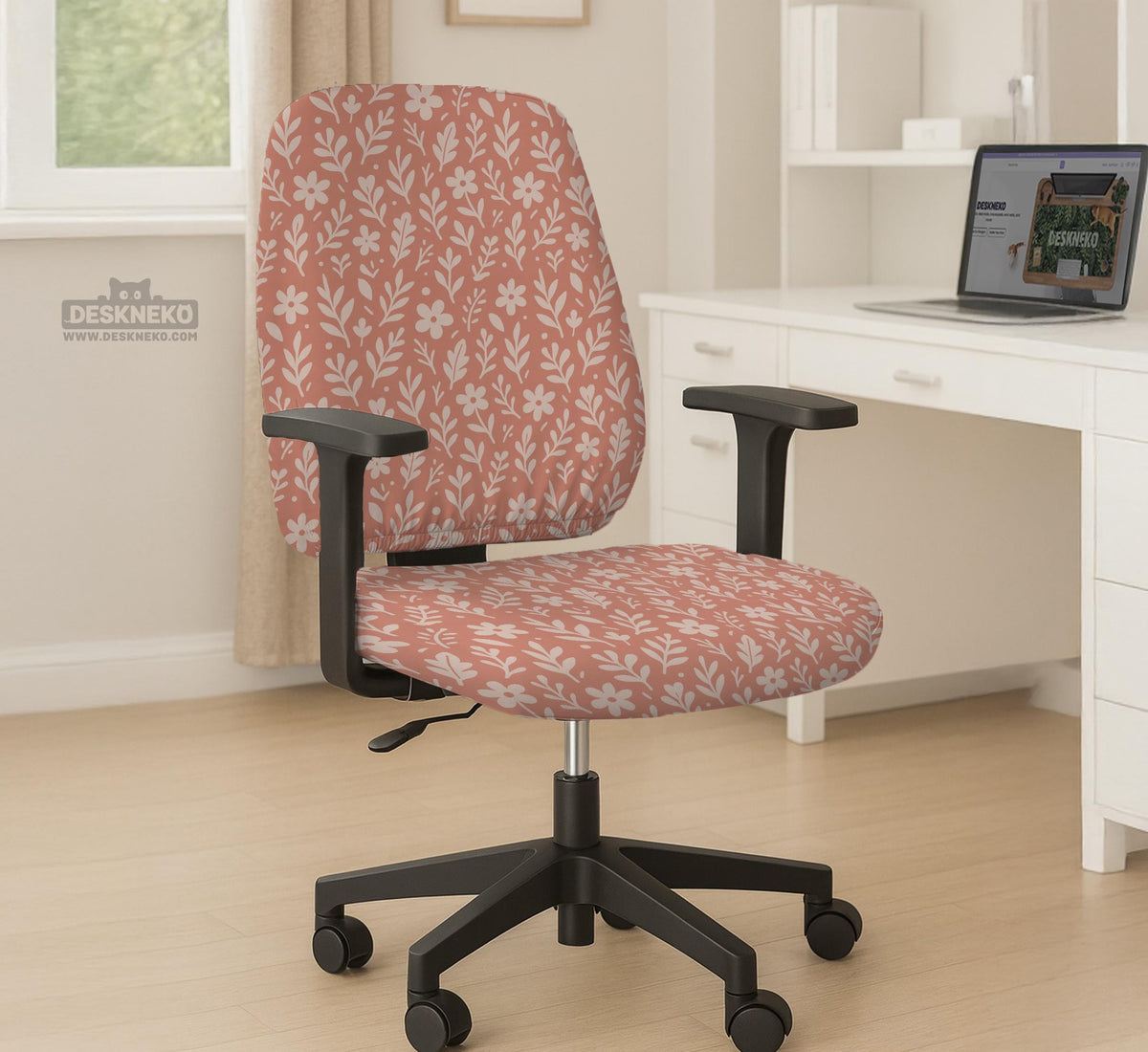 Pink chair cover with a botanical floral print shown on an office chair, with matching armrest covers and multiple cover style options.