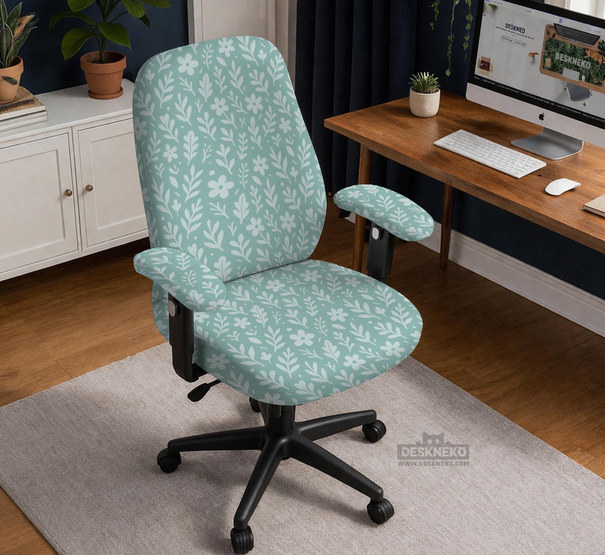 Sage and aqua green floral chair cover shown on a gaming chair with matching armrest covers.