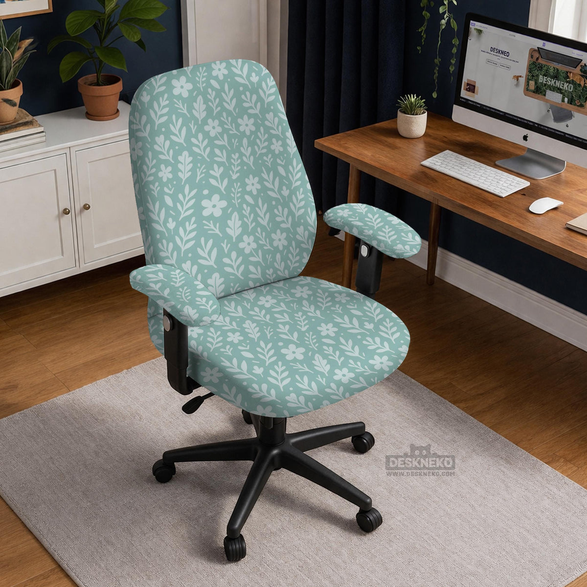 Sage and aqua green floral chair cover shown on a gaming chair with matching armrest covers.