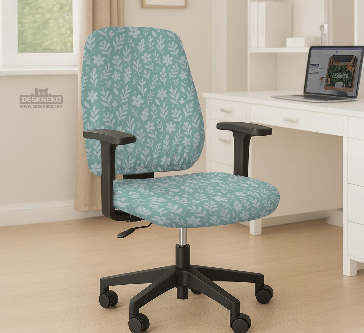 Sage and aqua green floral chair cover shown on a gaming chair with matching armrest covers.
