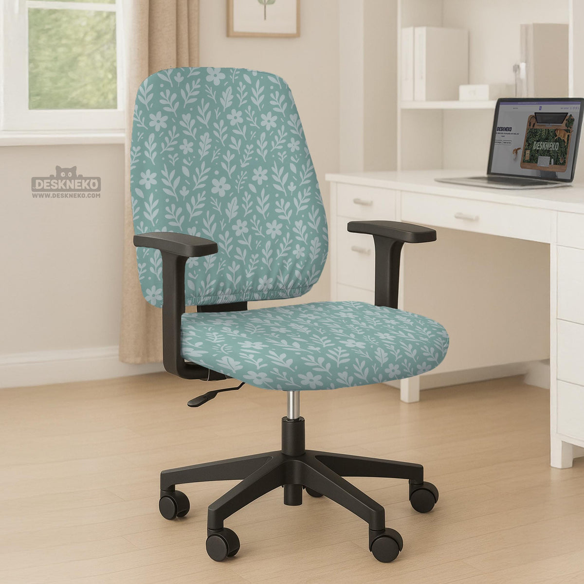 Sage and aqua green floral chair cover shown on a gaming chair with matching armrest covers.