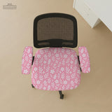 Blush pink chair cover with a small botanical floral pattern shown on an office chair.
