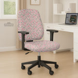 Pink floral stretch chair cover with a tulip pattern shown on a high-back gaming or office chair.