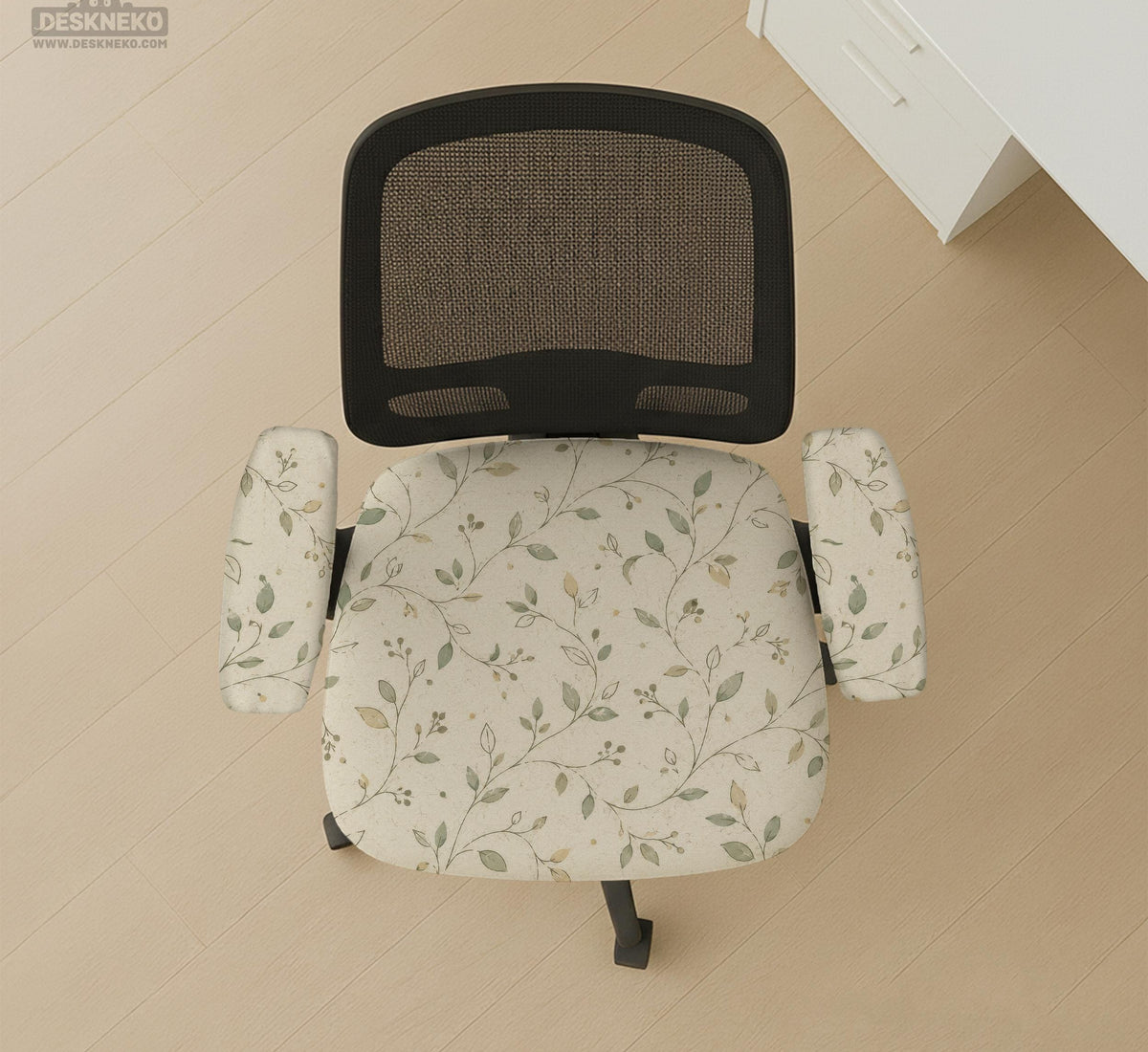 An ivory chair cover set with a subtle vine pattern shown on a black gaming chair, including cover options for the chair back, seat, and armrests.