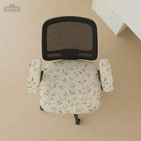 An ivory chair cover set with a subtle vine pattern shown on a black gaming chair, including cover options for the chair back, seat, and armrests.