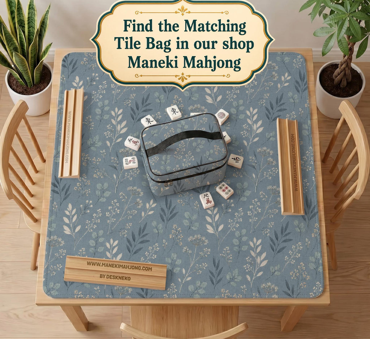Blue mahjong mat with a dusty linen-look background and small leafy botanical stems in a floral pattern.