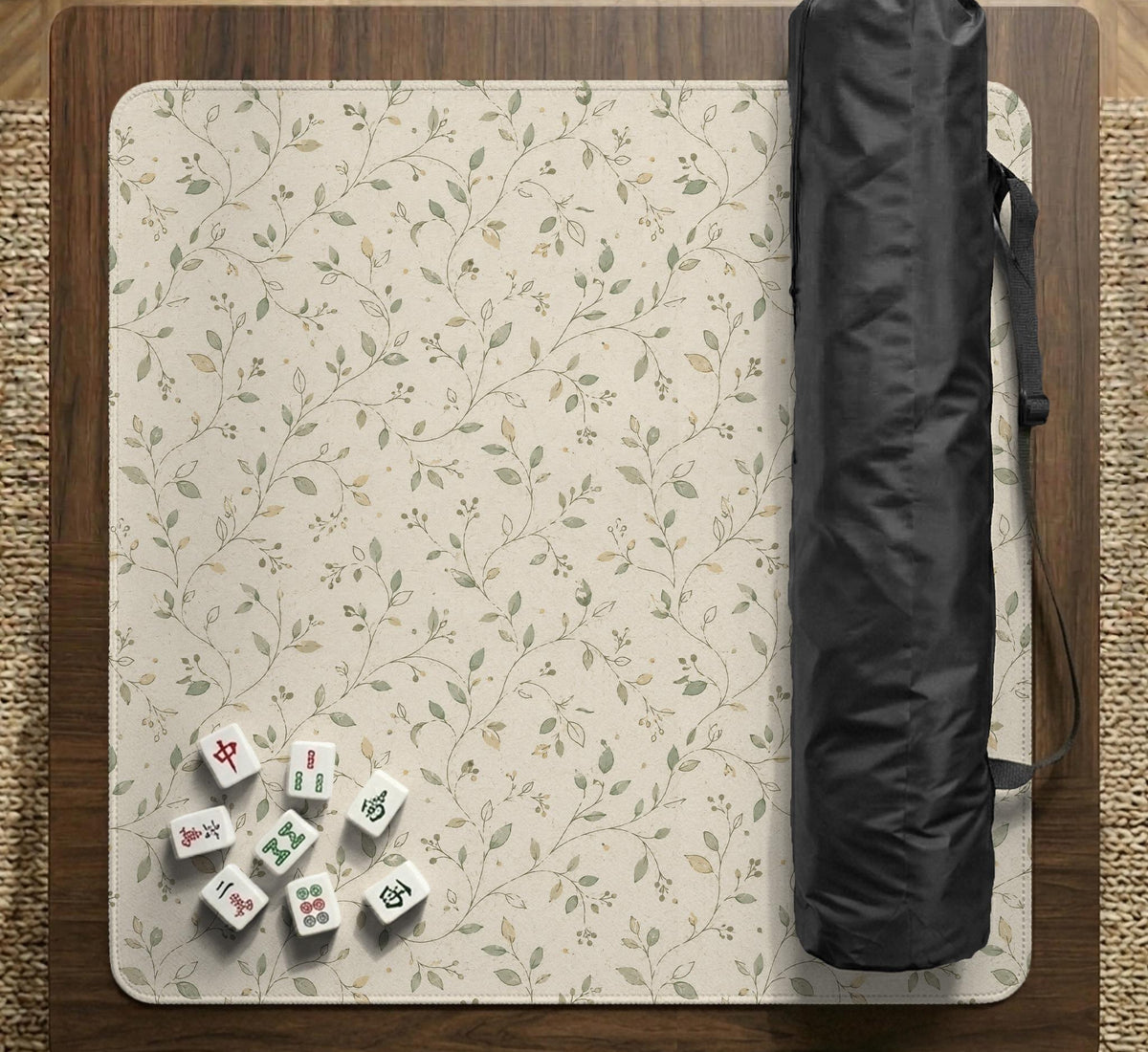 Cream square mahjong mat with a sage vine and leaf botanical pattern and scalloped edges.