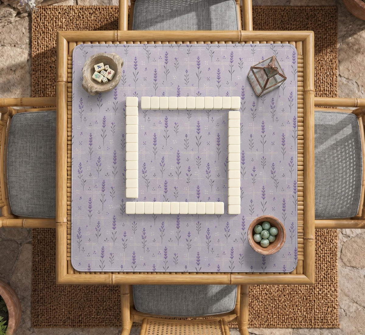 Lavender mahjong mat with a pale purple background, small botanical sprigs, and fine grid lines.