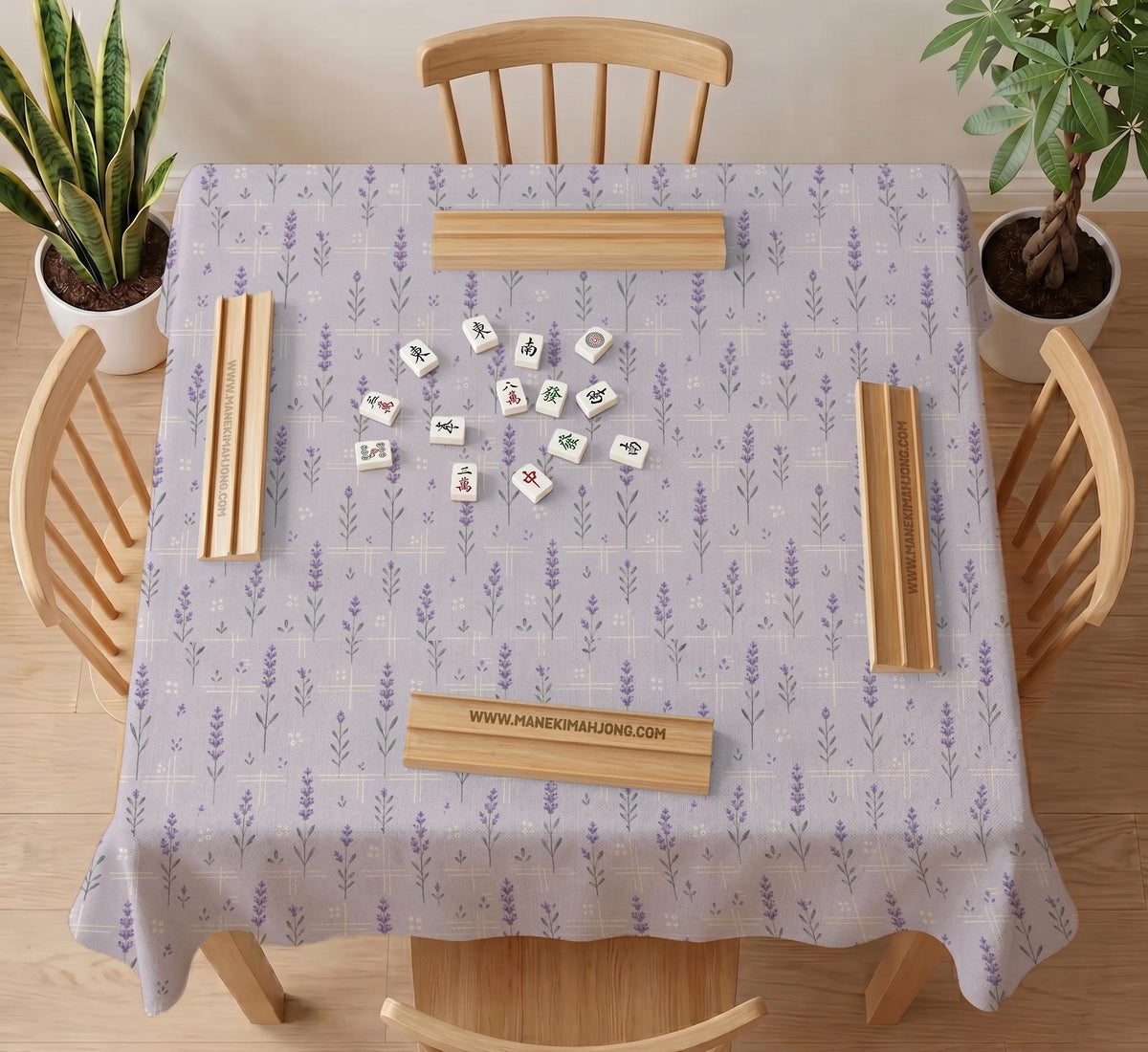 Lavender mahjong mat with a pale purple background, small botanical sprigs, and fine grid lines.