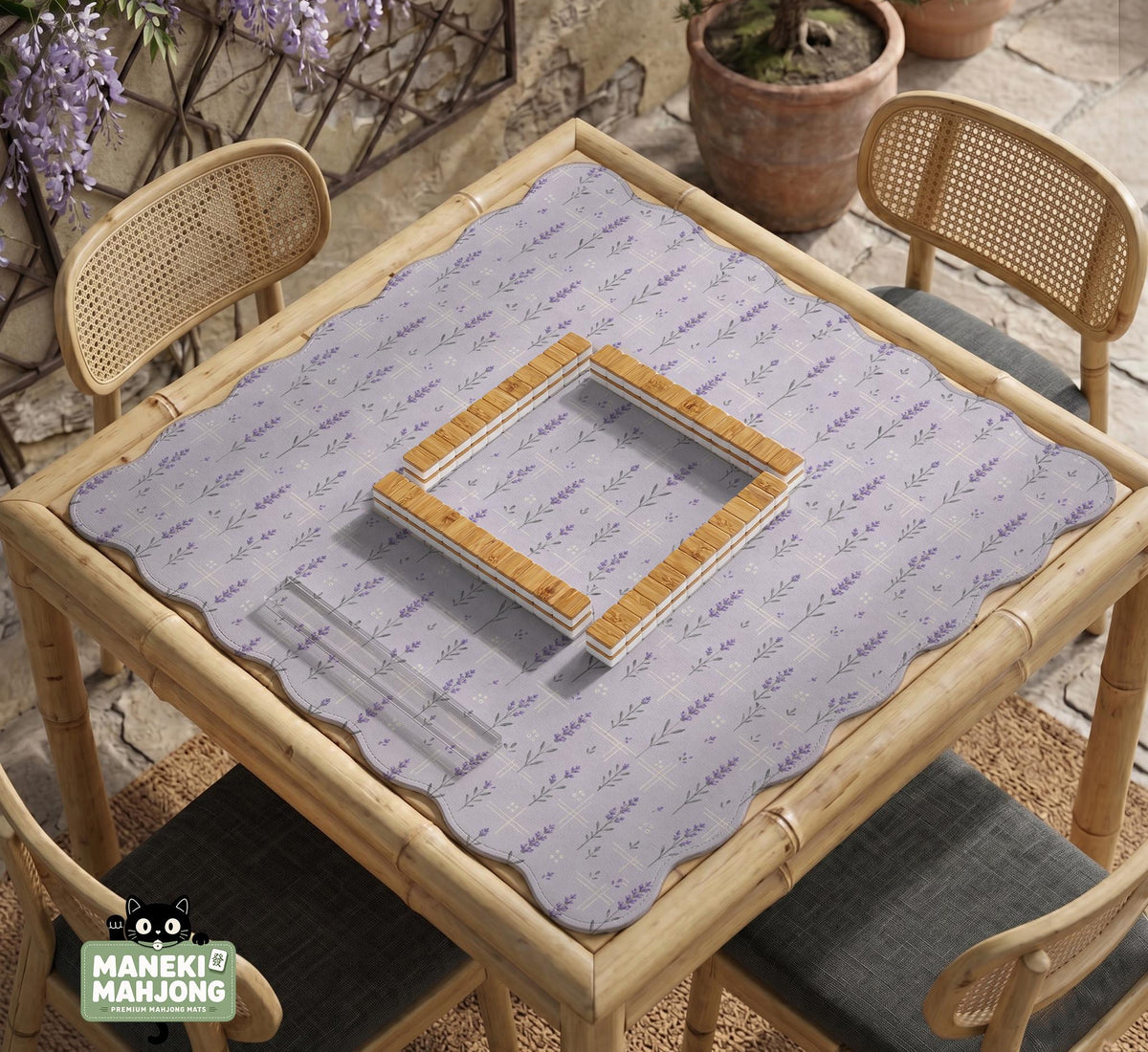 Lavender mahjong mat with a pale purple background, small botanical sprigs, and fine grid lines.