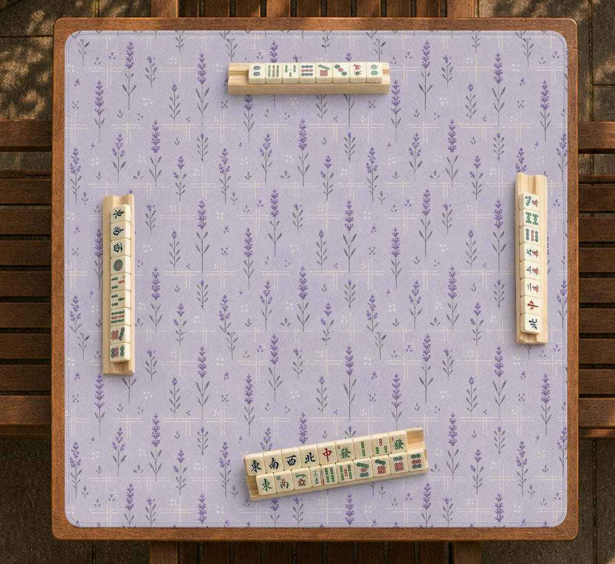 Lavender mahjong mat with a pale purple background, small botanical sprigs, and fine grid lines.