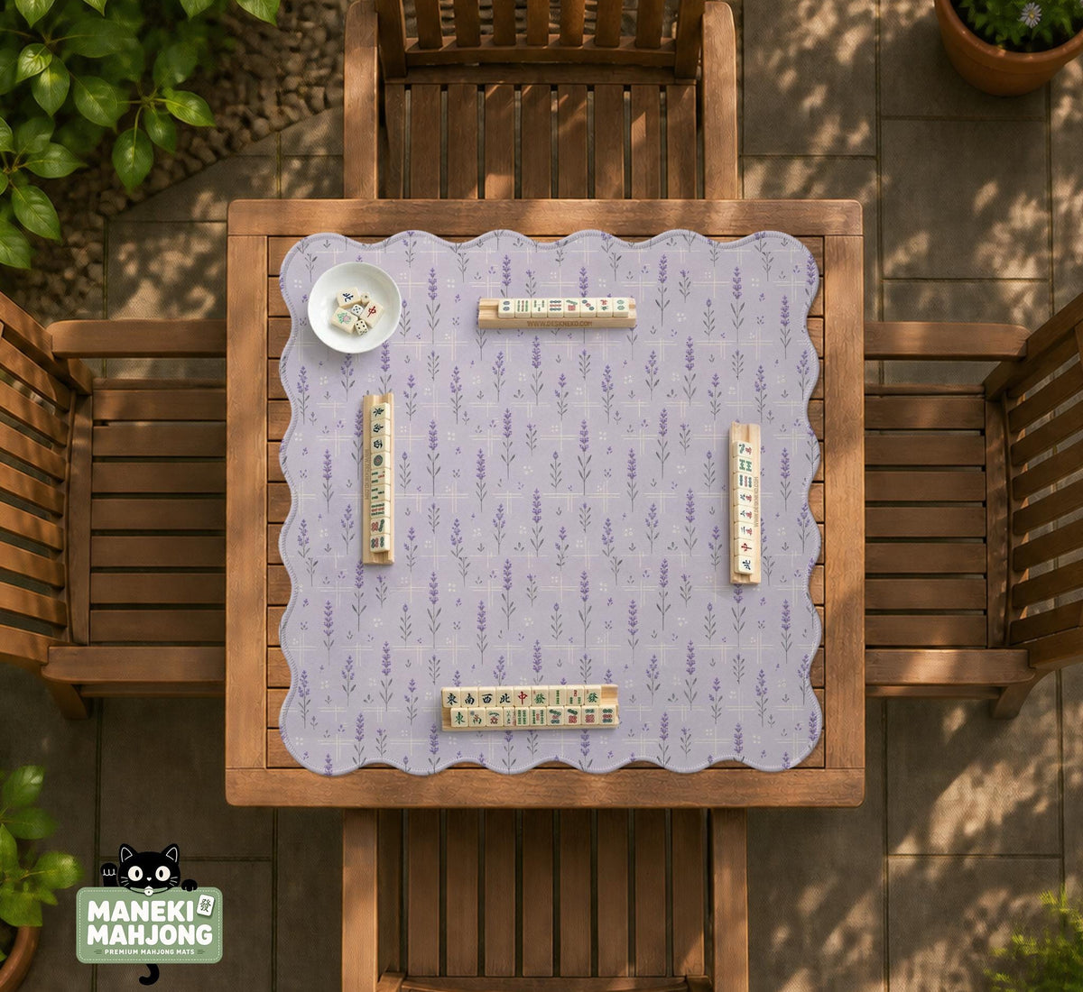 Lavender mahjong mat with a pale purple background, small botanical sprigs, and fine grid lines.
