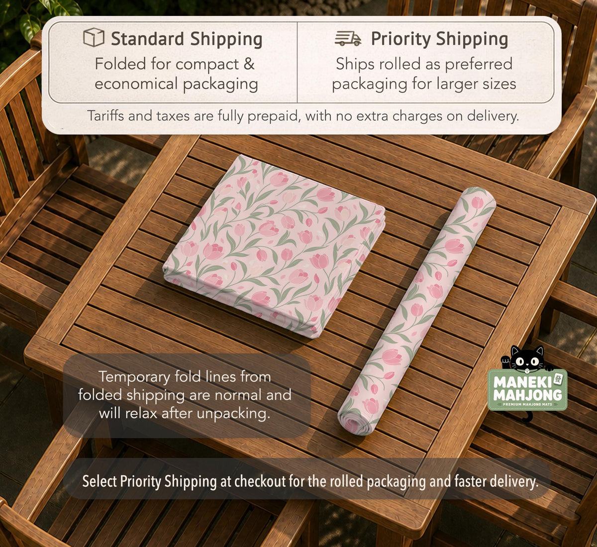 Pink mahjong mat with a tulip floral pattern in blush and sage tones and a scalloped edge.