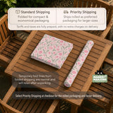 A pink mahjong mat with tulip flowers, sage leaves, and a light pastel background.