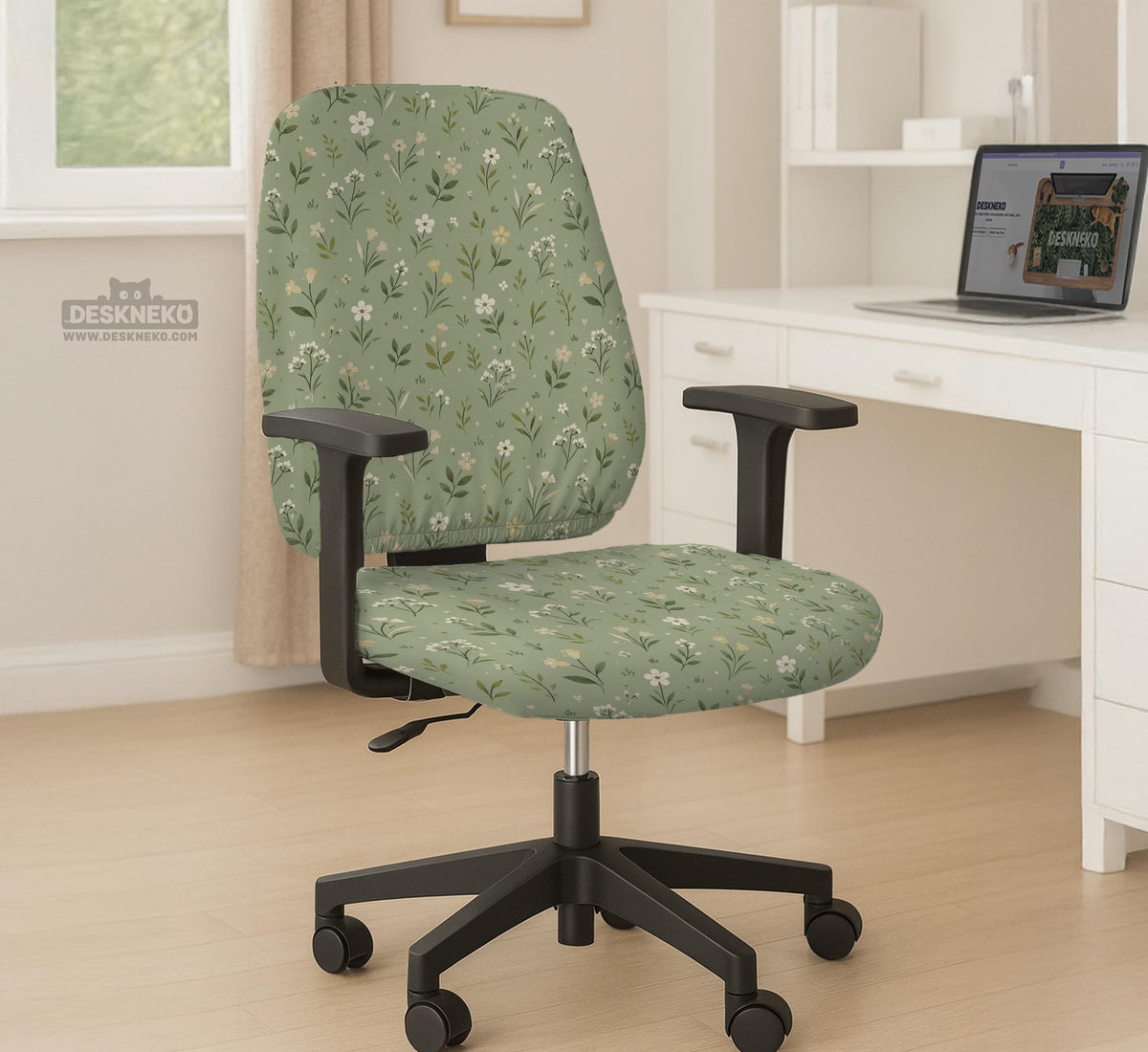 Sage green chair cover with a small floral print shown on a desk chair with a high back.