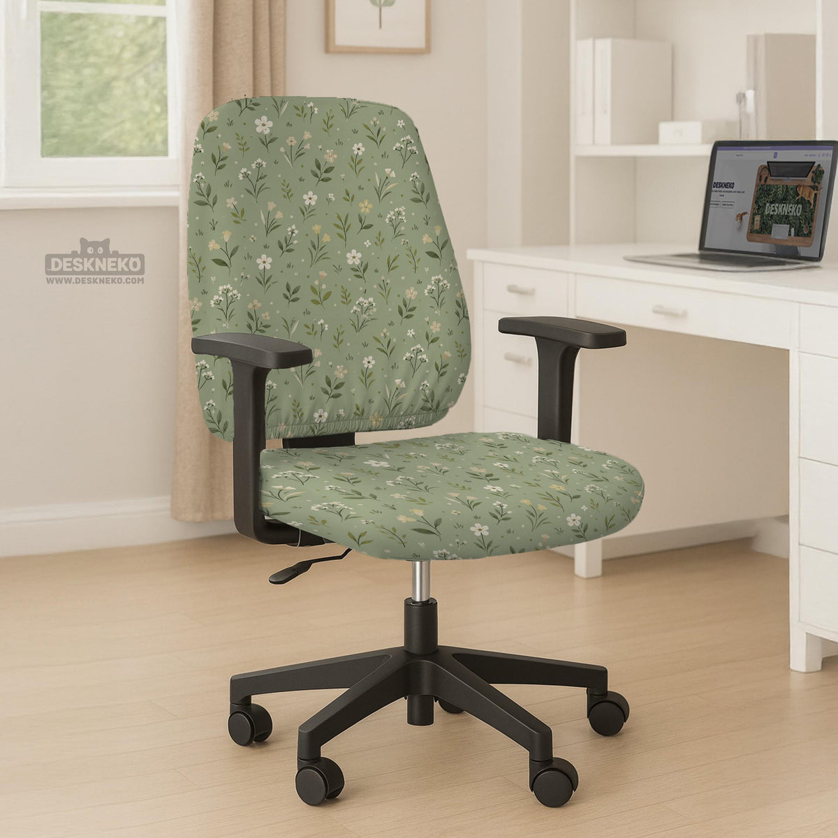Sage green chair cover with a small floral print shown on a desk chair with a high back.