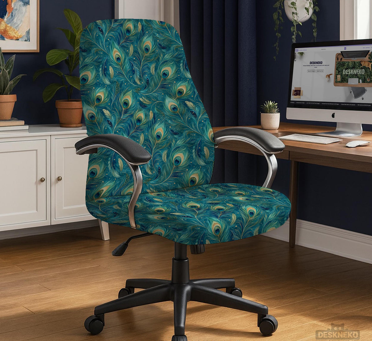 A blue green chair cover with a peacock feather design shown on an office chair with armrests.
