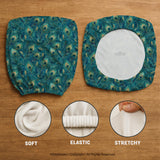 Blue green chair cover with a peacock feather pattern shown on an office chair, with fitted stretch fabric and armrest coverage visible in the listing image.