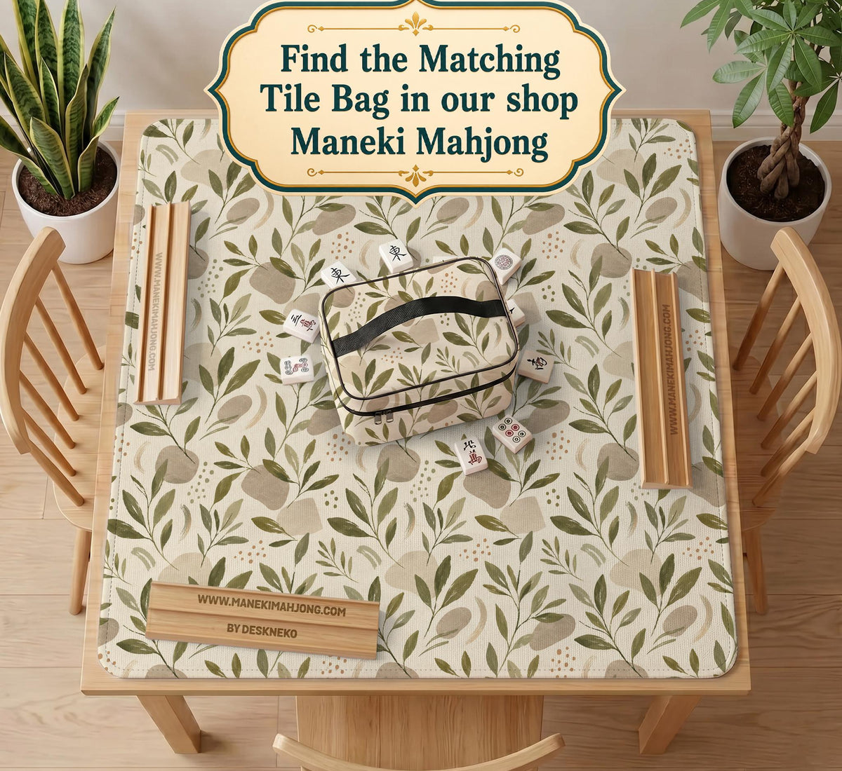 Green botanical mahjong mat with sage leaf and floral design and a scalloped edge.