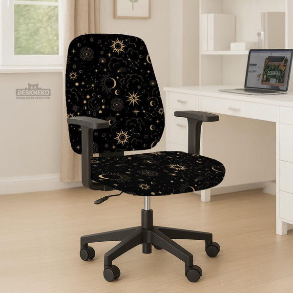 Black chair cover with gold moons, suns, stars, constellations, and line art printed across the fabric.