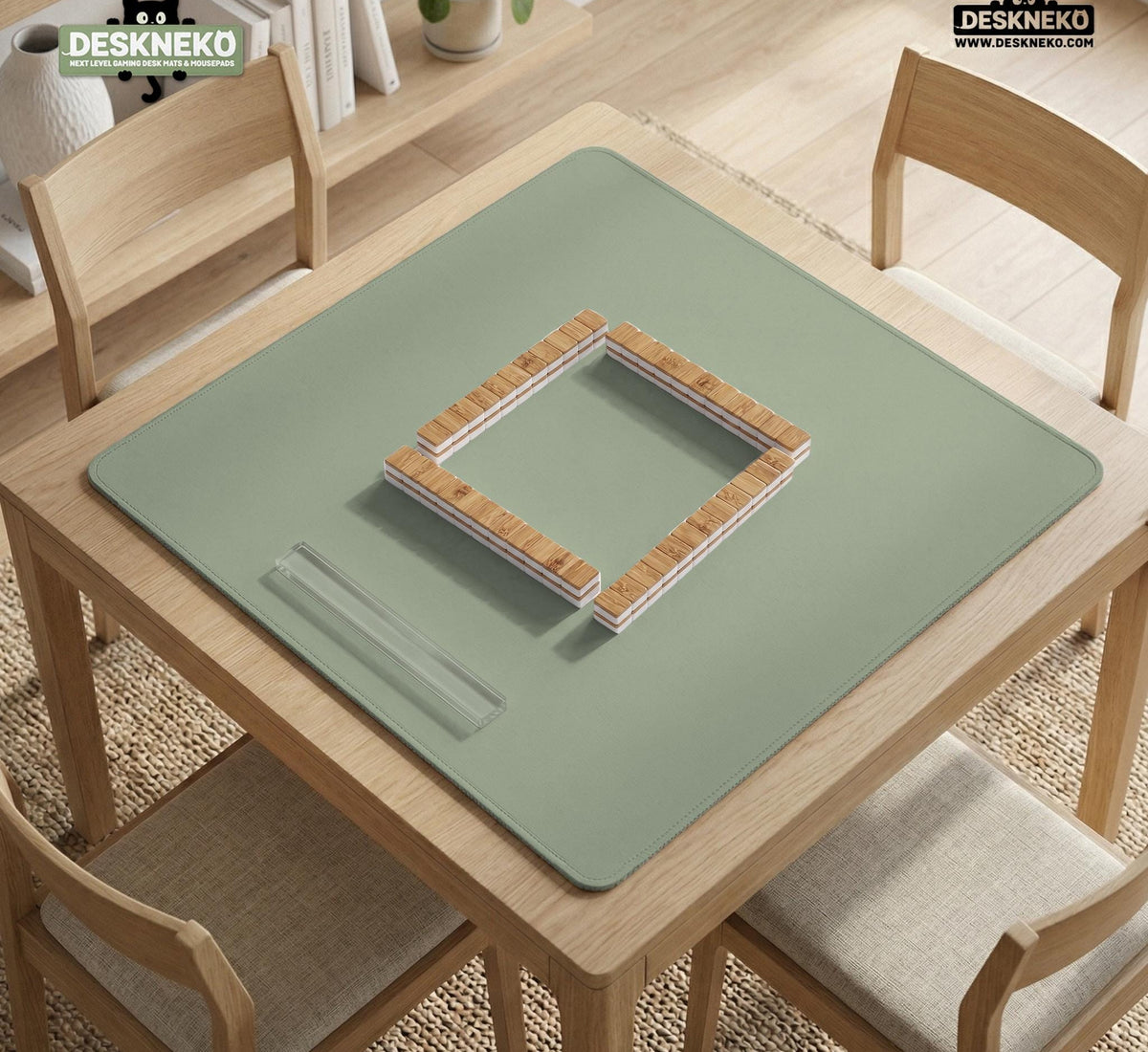 A plain light sage green square mahjong mat with a smooth solid-color surface.