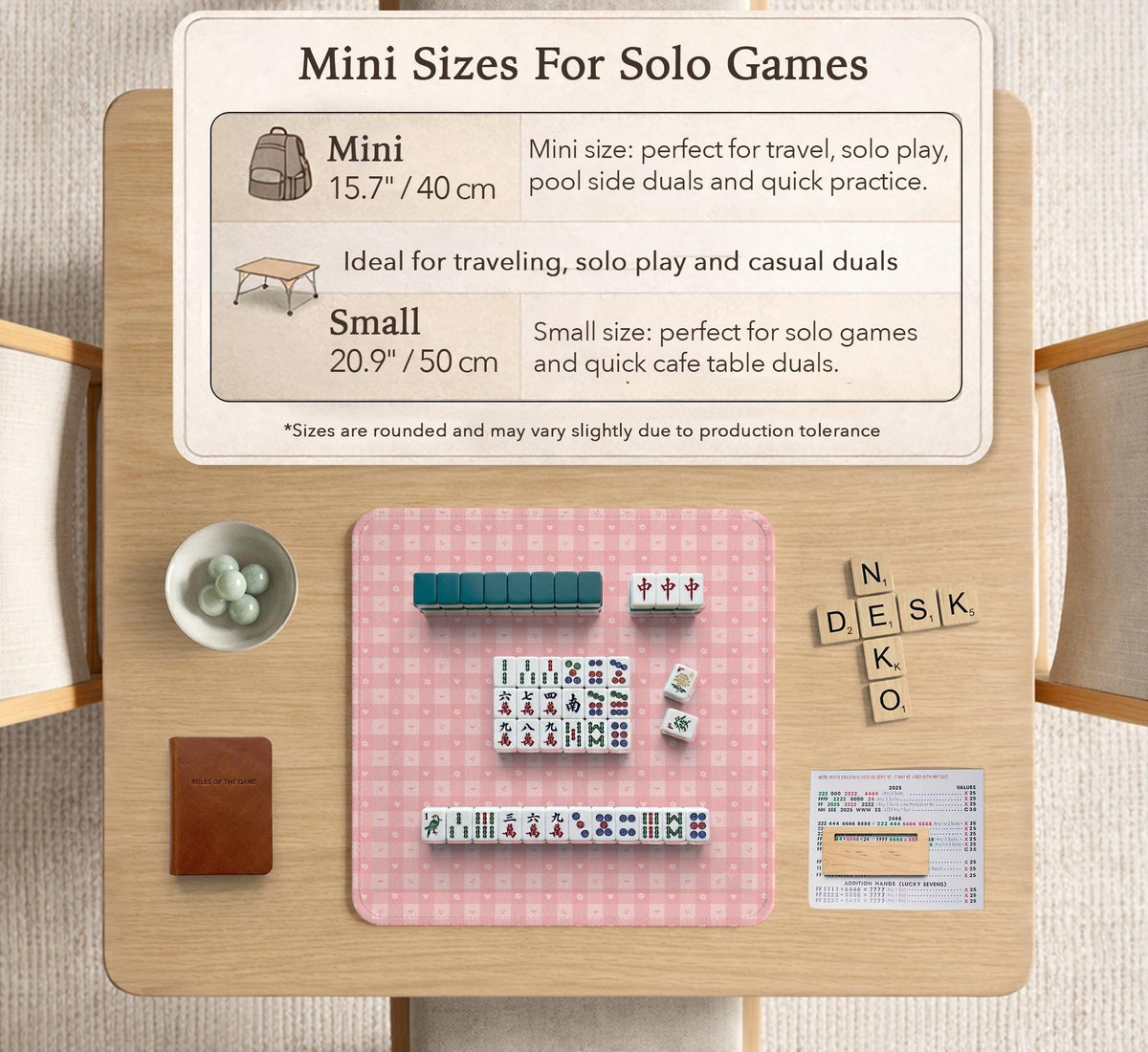 Pink checkered mahjong mat with small hearts and flowers.