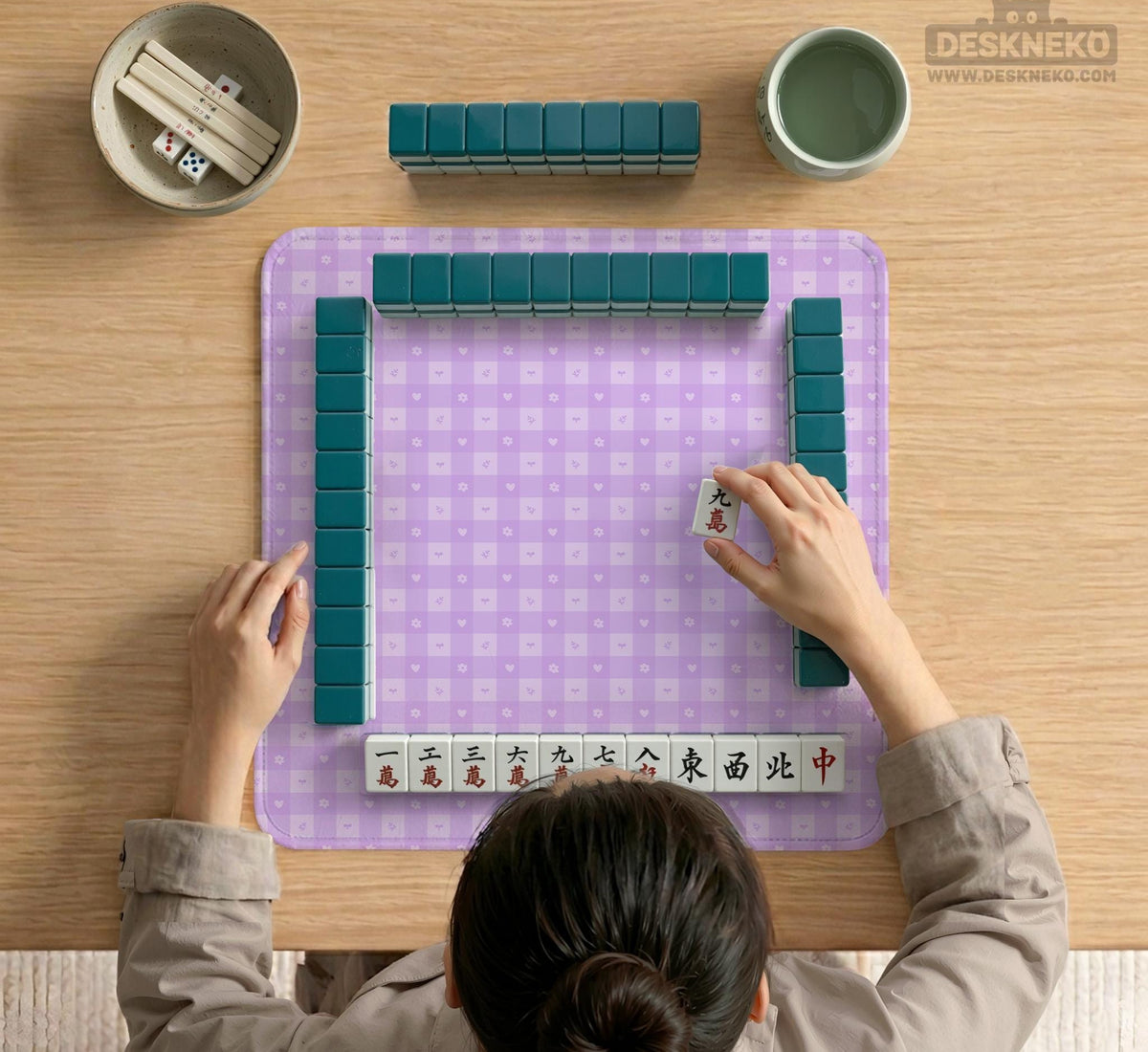Lavender gingham mahjong mat with a scalloped edge and a pastel check pattern.
