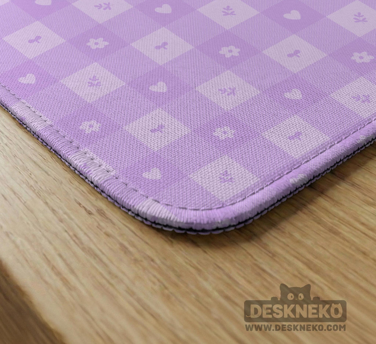 Lavender gingham mahjong mat with a scalloped edge and a pastel check pattern.