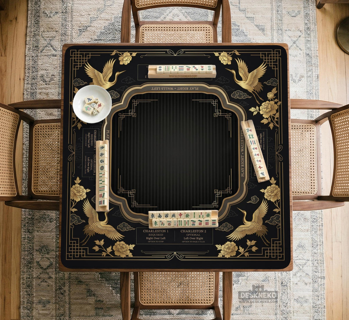 Black and gold square mahjong mat with an art deco crane and floral border, rule reminders around the edges, and a blank center area.