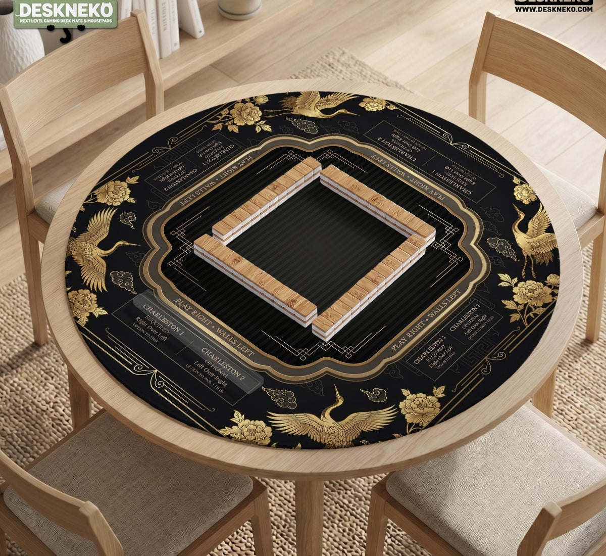 Black and gold square mahjong mat with an art deco crane and floral border, rule reminders around the edges, and a blank center area.