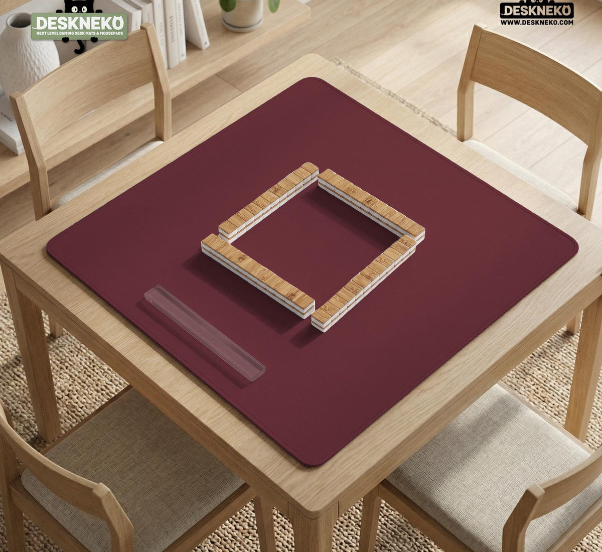 Plain burgundy square mahjong mat with scalloped edges on a white background.